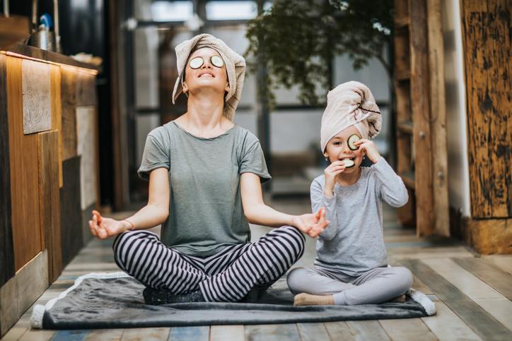 mother and child doing yoga to boost immunity
